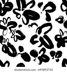 Creative flower seamless pattern. Textures made with black ink. Hand brush painting for your designs: logo, for posters, invitations, cards, etc. Vector.