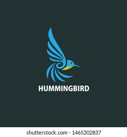 A creative and fluid vector logo of a hummingbird in flight, featuring elegant blue wing spans and a vibrant yellow-green chest detail. The bird is depicted in a graceful, upward-moving pose with swirling line art that symbolizes speed, agility, and beauty. This minimalist emblem is perfect for travel agencies, environmental organizations, creative studios, and wellness brands looking for a professional and natural identity.