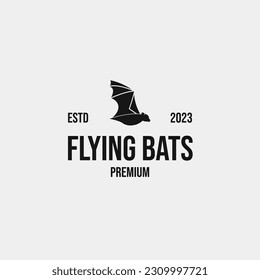 Creative flying bats logo design concept illustration idea
