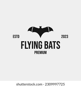 Creative flying bats logo design concept illustration idea