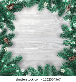 Creative frame made of Christmas fir branches on white wooden background with lights, pine cones. Xmas and New Year card. Vector Illustration
