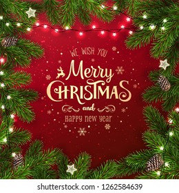 Creative frame made of Christmas fir branches. Gold Merry Christmas and New Year text on red background with lights, pine cones. Xmas and New Year card. Vector Illustration