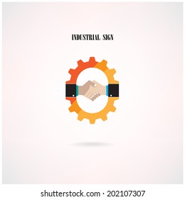 Creative gear concept and handshake abstract sign on background