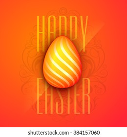 Creative glossy Egg on floral design decorated orange background for Happy Easter celebration.