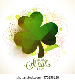 Creative glossy Shamrock Leaf on abstract background for Happy St. Patrick's Day celebration.