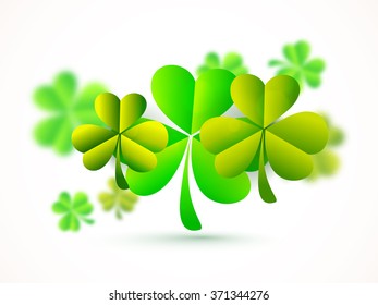 Creative glossy shamrock leaves for Happy St. Patrick's Day celebration.