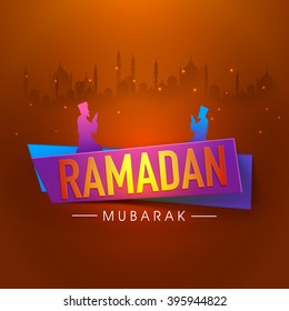 Creative glossy text Ramadan Kareem with illustration of praying men on shiny mosque silhouetted background for Islamic Holy Month of Prayers celebration.
