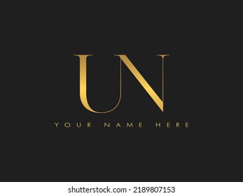 creative golden luxury un, nu initial elegant letter monogram logo vector template 