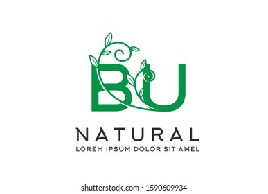 Creative green floral wedding initial BU icon design. Vector logo template