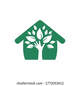 Creative green hand tree and house logo design. Natural home care logo. Spa logo. Beauty salon or yoga logo.	