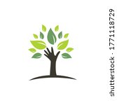 Creative green hand tree logo design. Natural products logo. Cosmetics icon. Spa logo. Beauty salon or yoga logo.