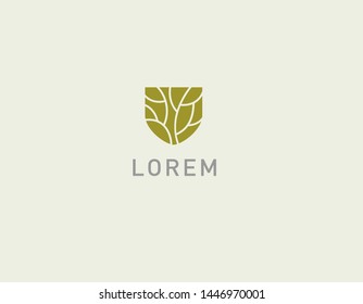 Creative green logo symbol abstract floral pattern and shield for company