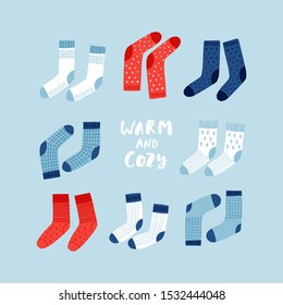 Creative hand drawn card with Christmas socks: Cozy winter. Vector cartoon illustration. and drawn typography poster. Xmas design.