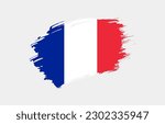 Creative hand drawn grunge brushed flag of France with solid background