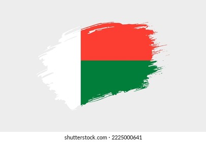 Creative hand drawn grunge brushed flag of Madagascar with solid background