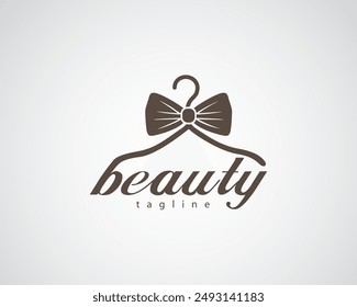 creative hanger utiliza una pajarita que se combina con el diseño del logotipo de la letra b