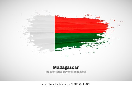 Creative happy independence day of Madagascar country with grungy watercolor country flag background