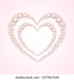 Creative heart made by pearls on glossy pink background for valentine's day celebration concept.