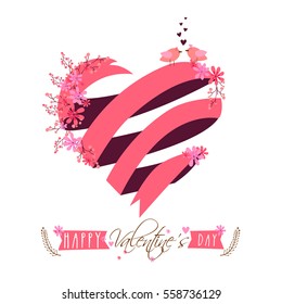 Creative heart made by pink ribbon for Happy Valentine's Day celebration.