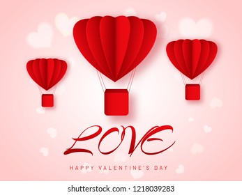 Creative Heart shaped hot air balloons origami on shiny pink background for Happy Valentine's Day celebration.