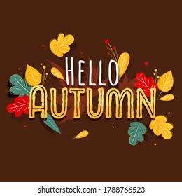 Creative Hello Autumn Text With Colorful Leaves And Berries Decorated On Brown Background.