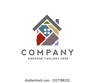 creative house made from colorful stone bricks logo vector