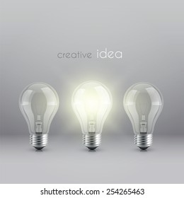 creative idea solution symbol with burning light bulb 