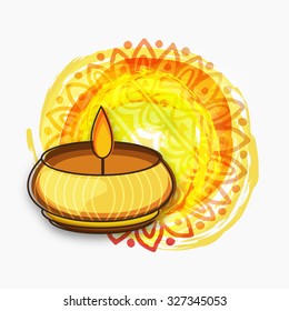 Creative illuminated lit lamp on floral decorated colourful paint stroke background for Indian Festival of Lights, Happy Diwali celebration.