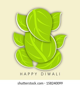 Creative illustration of Hindu mythology Lord Ganesha made with green leaves on abstract background for Indian festival of lights, Happy Diwali. 