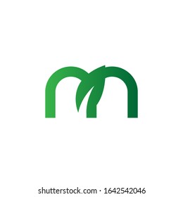 Creative initial green letter M with leaf logo. Vector design template elements for corporate identitiy, business company, eco application, posters, or card. Abstract leaves isolated on white.