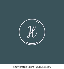 Letras iniciales creativas logotipo de escritura a mano H con vector de plantilla dibujado a mano en círculo