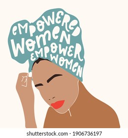 creative inspirational feminist quote 'Empowered women empower women' written on a woman's turban. International women's day, feminism theme. Poster, greeting card, print design.
