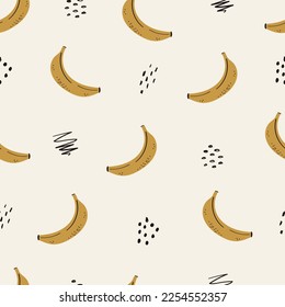 Creative kids seamless pattern with bananas. Bright and juicy summer print is perfect for baby textiles, accessories and scrapbooking. Cartoon yellow bananas and doodles. Boho style.