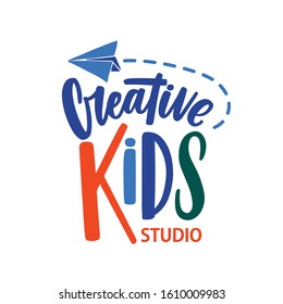 Creative kids studio flat vector logo. Cartoon paper plane with lettering isolated on white background. Art center logotype design. Children early development lessons emblem concept.