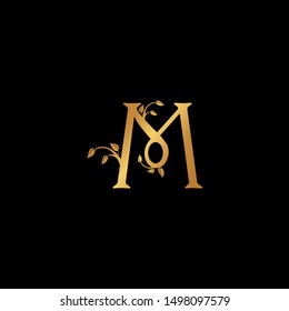 Creative Letter M Logo icon with leaf ornament gold color. Creative Design with dot shape letter M for business, technology, finance, network, start up and more brand.