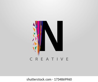 Logo De La Carta Creativa N. Mosaic Resumen N diseño de letras, hecho de varias formas de tiras en color.
