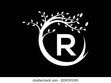 Creative Letter R Black and white monogram alphabet with tree. Green, eco-friendly logo concept. Modern vector logo for ecological business and company identity