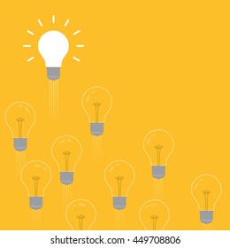 Creative light bulb idea concept on yellow background