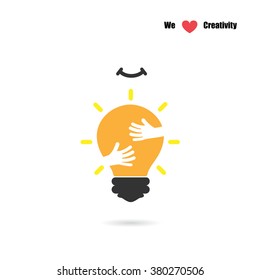 Creative light bulb logo design vector template with small hand.Education and business logotype concept. Vector illustration