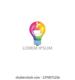 Creative Light Bulb Pharmacy medical logo design. Natural mortar and pestle logotype, medicine herbal illustration symbol icon vector design.