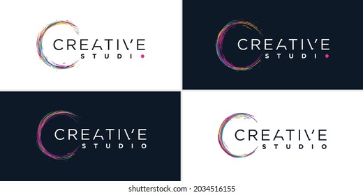 Creative logo with color brush concept Premium Vector