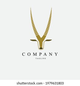 Creative logo with deer head and antlers shape. Red. Simple and unique logo