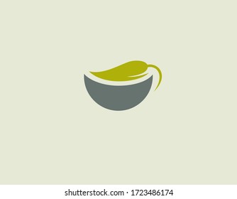 Creative logo icon mug and leaf of tea.