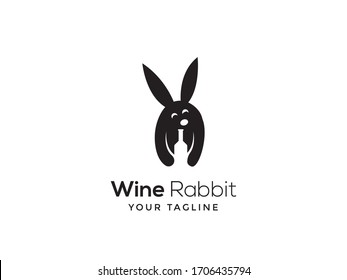 logotipo creativo conejo traer vino de estilo negativo