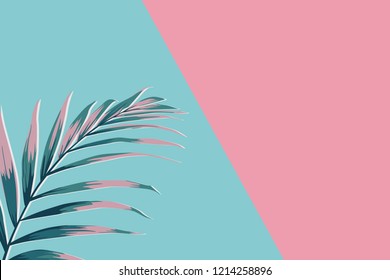 Creative minimal summer idea. Green pink palm leaf branches. Tropical exotic background with empty space for text. Concept creative art. Flat lay, top view.