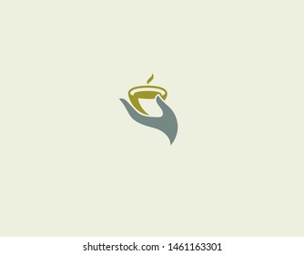 Creative minimalistic logo icon of tea cup in human hand