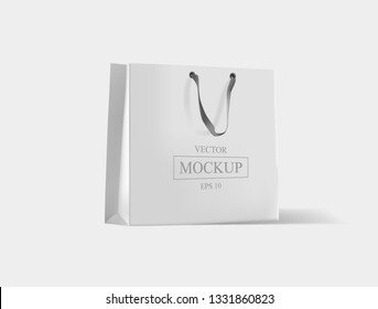 Creative mockup. Shopping bag. Mock-up of blank package, mockup of white paper shopping bag with handles. Vector illustration