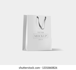 Creative mockup. Shopping bag. Mock-up of blank package, mockup of white paper shopping bag with handles. Vector illustration