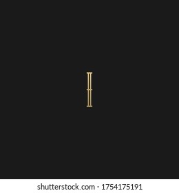 Creative modern elegant trendy unique artistic black and golden color II initial based letter icon logo.