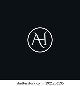 Creative modern elegant trendy unique artistic black and white color AH HA H A initial based letter icon logo.